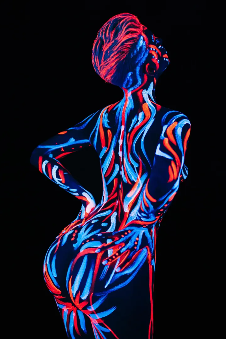 Fluorescent bodypaint under UV light