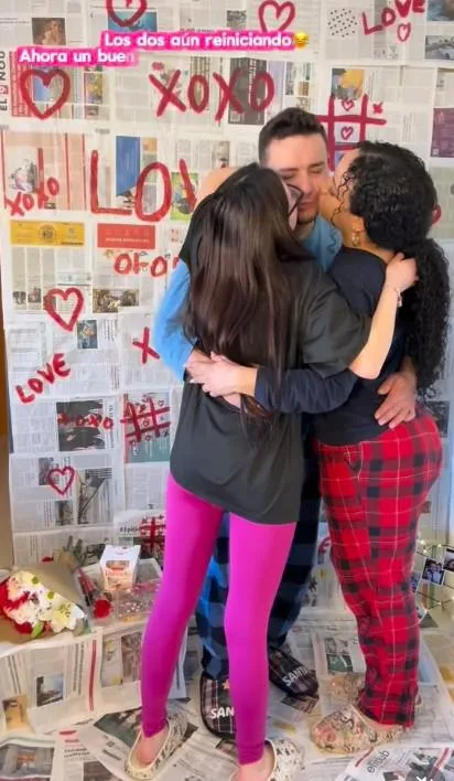 Three people, six hands, one heartbeat.