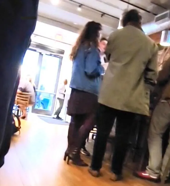 Denim jacket and knee high leather high-heeled boots