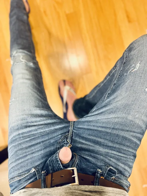 Head poking out in jeans