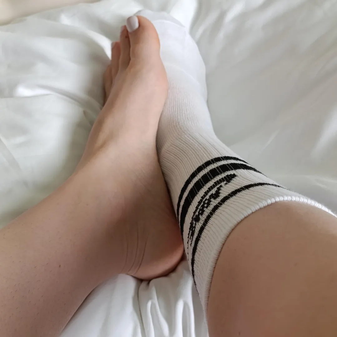 Do you want to take off my socks ,cute feet