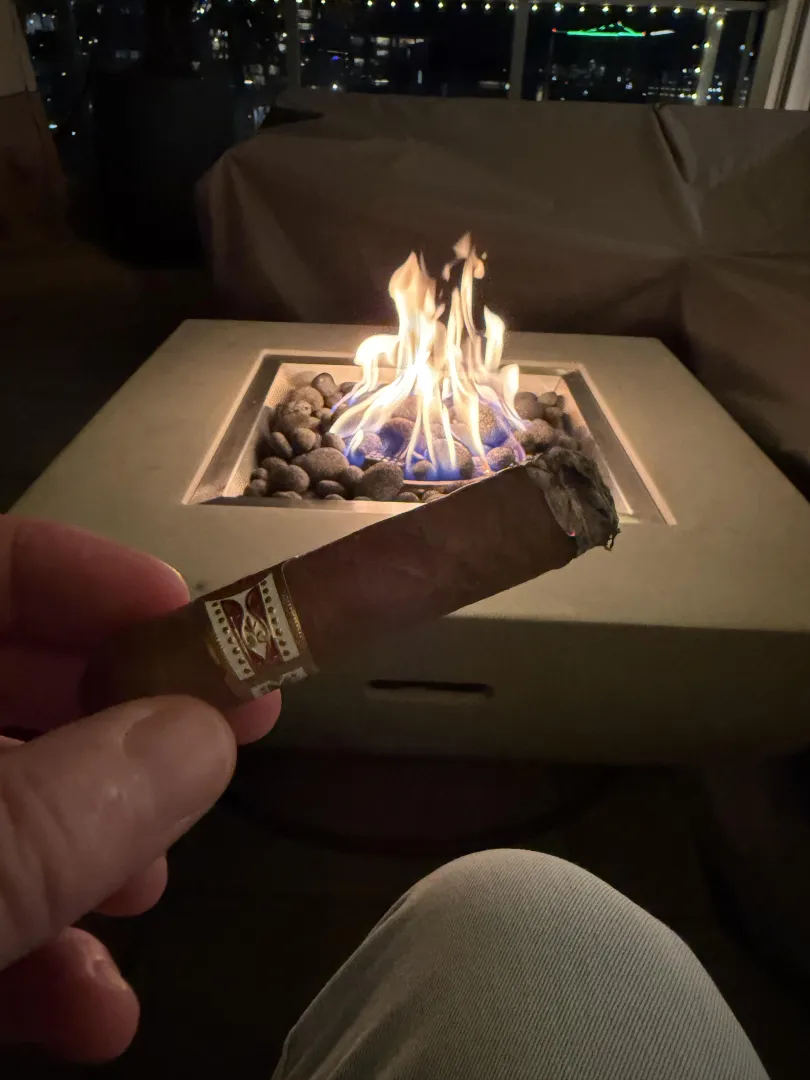 Happy Friday! H. Upmann Half corona and some Bumbu Rum. What are you smoking?