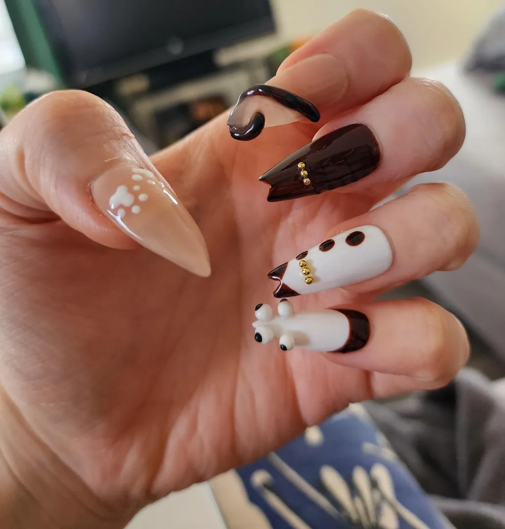 Pretty, unique nails.