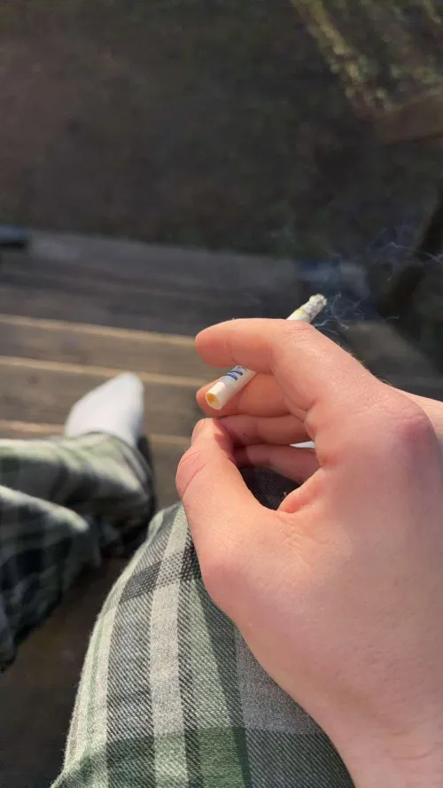 Enjoying a cigarette, feels good to inhale the smoke and destroying my lungs.
