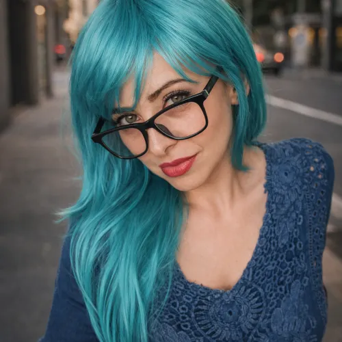 My blue hair matches with my green eyes