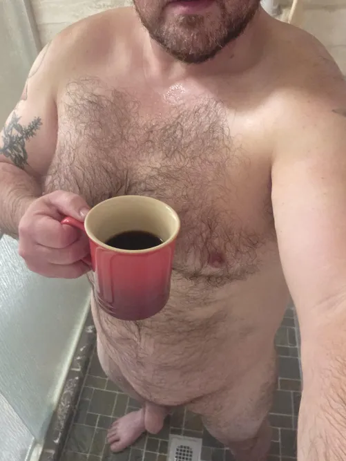 Morning shower always easier with a cup of coffee