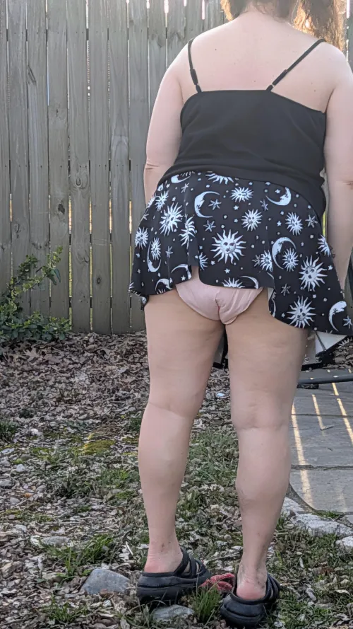 Backyard fun with friends when this candid pic was snapped.  I was going to grab my water.