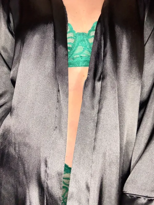 Just a little bra peek through the robe