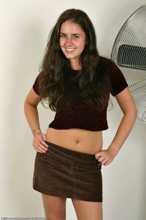 Kacey dressed, still sexy...