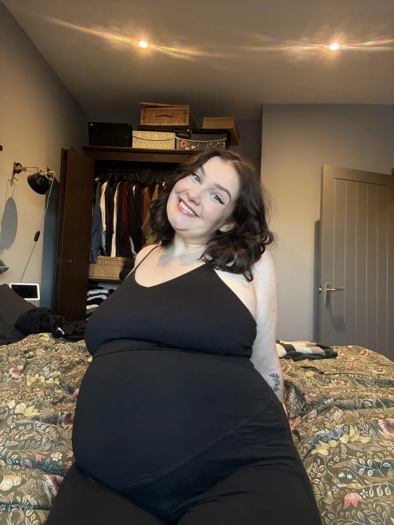 Just a pregnant mama smiling by