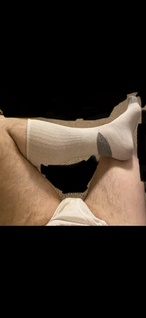 Just lounging in my white tube socks and tighty whities after a long day.
