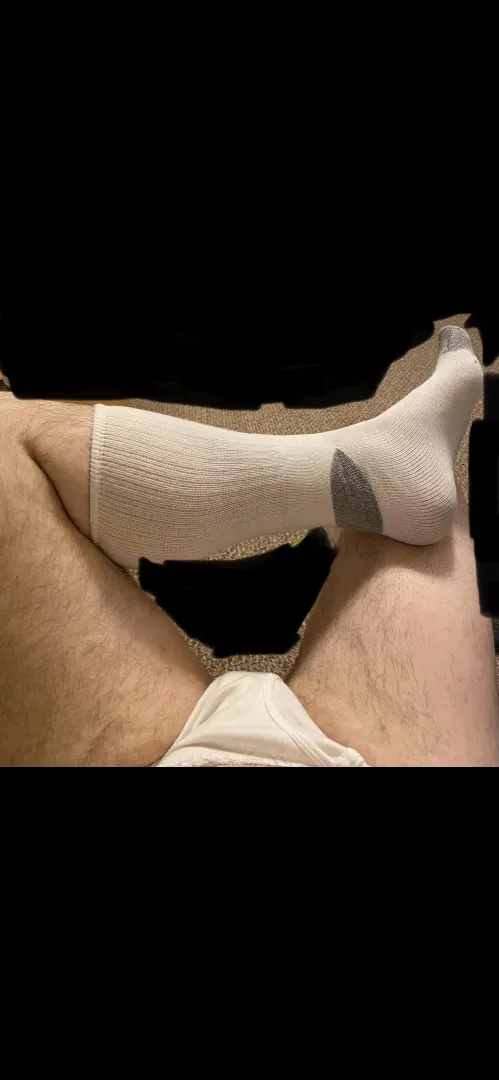Just lounging in my white tube socks and tighty whities after a long day.