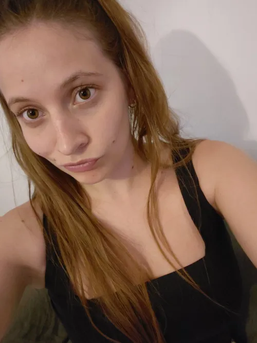 Blonde with brown eyes