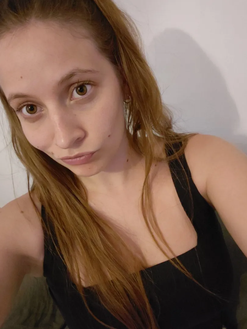 Blonde with brown eyes