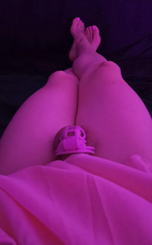 Locked up, skirt on, toes painted to match my cage. What's missing is a pink plug for my butthole 