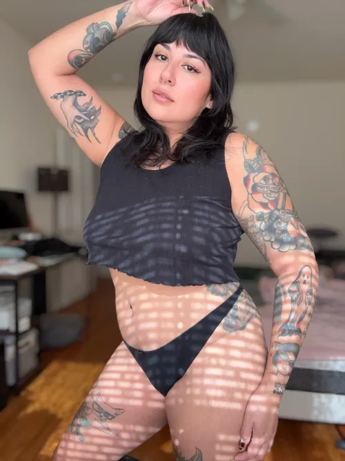 Showing off the cropped tank top I went to sleep in