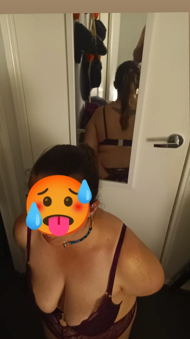 Waiting patiently like a good girl, collared and tied