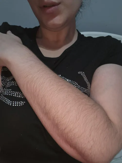 My naturally hairy and well-groomed [arms]